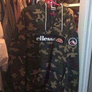 Manteau de pluie ellesse